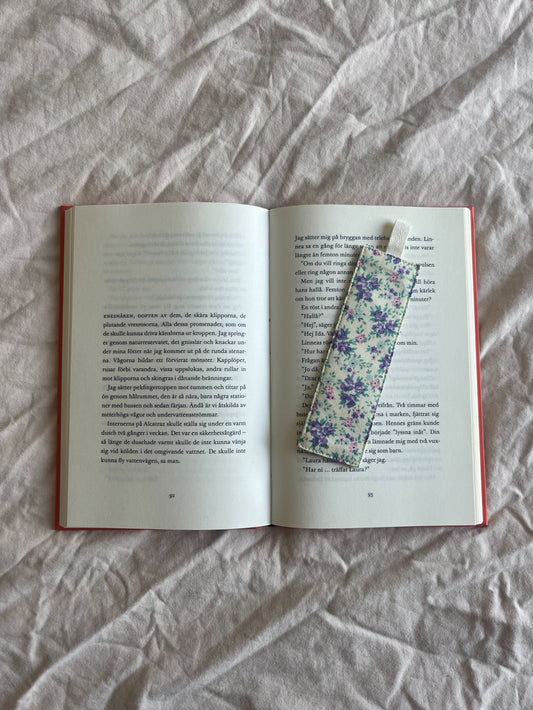 Blommigt bokmärke tyg