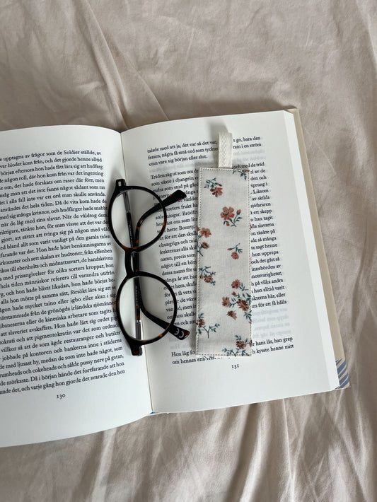 Blommigt bokmärke tyg