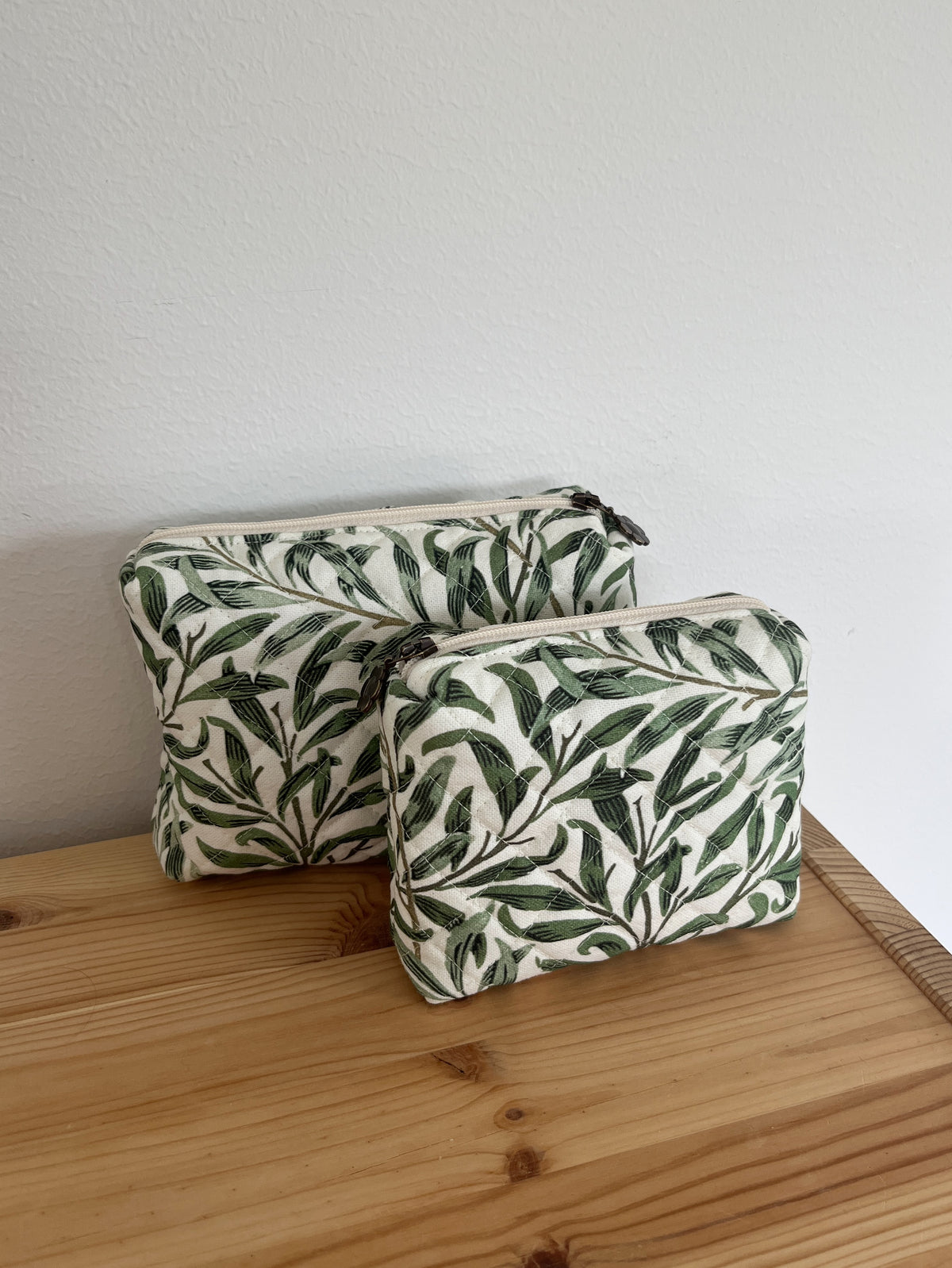 Quiltad necessär grönt bladmönster