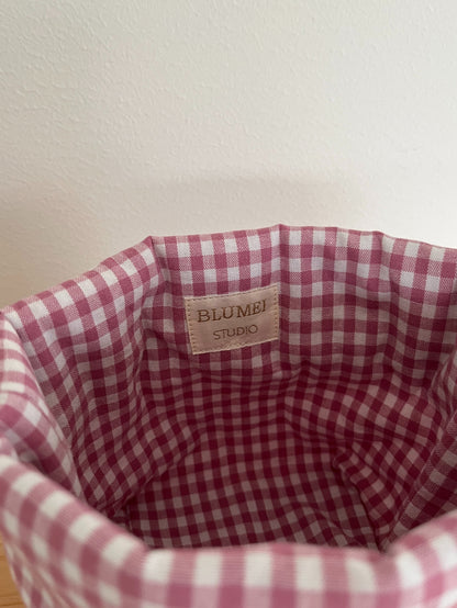 Rutig förvaringskorg rosa