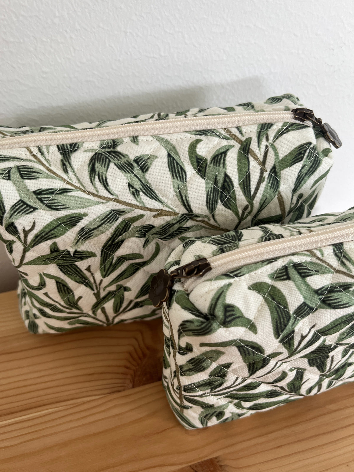 Quiltad necessär grönt bladmönster