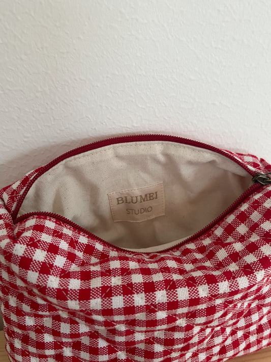 Quiltad röd rutig necessär