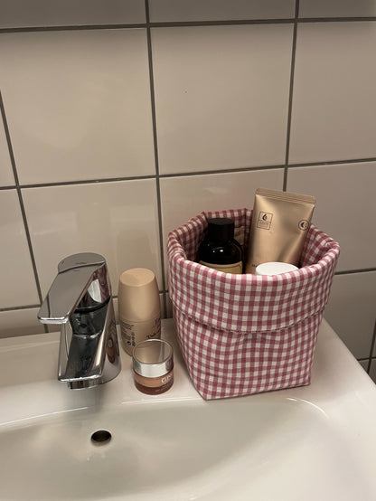 Rutig förvaringskorg rosa